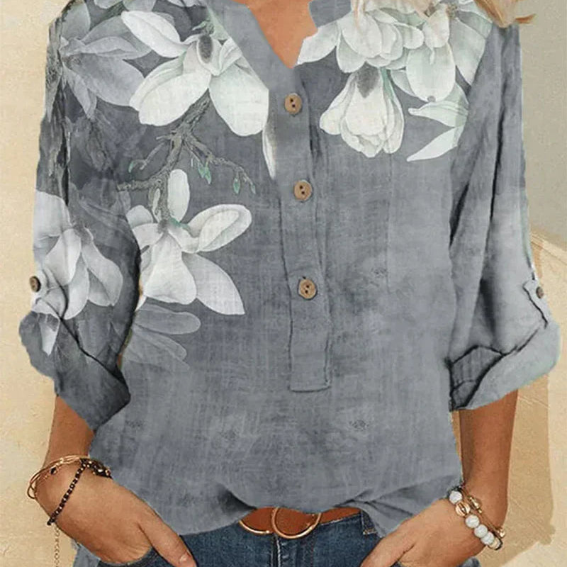 Camisa feminina de gola alta em algodão com bordados florais