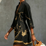 Diana | Vestido curto estampado em preto e dourado com decote em V e renda de crochê para Mulher