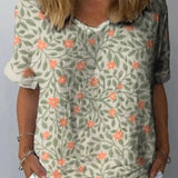 Aida - Camisa casual para mulher em algodão e linho com um bonito design floral e estampado artístico